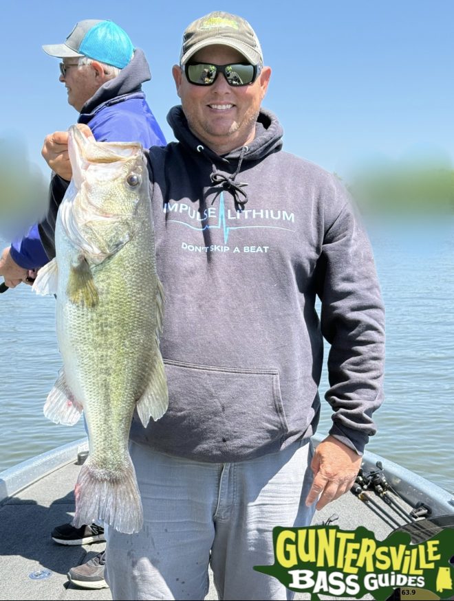 Giant bass held by Capt Jim Leary from guntersville bass guides