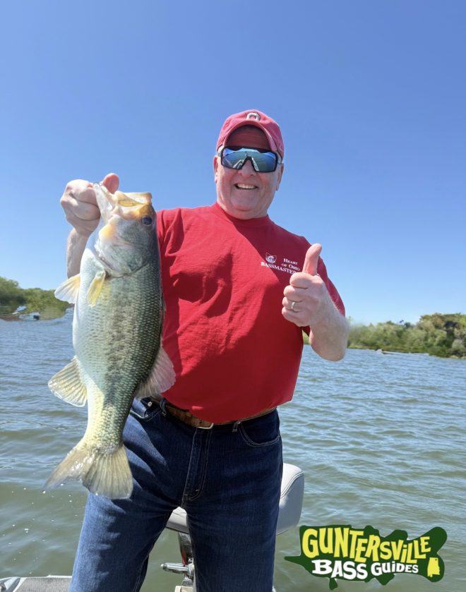 Angler Gives thumbs up to lake Guntersville’s top guide Capt Jim Leary during a spring fishing trip