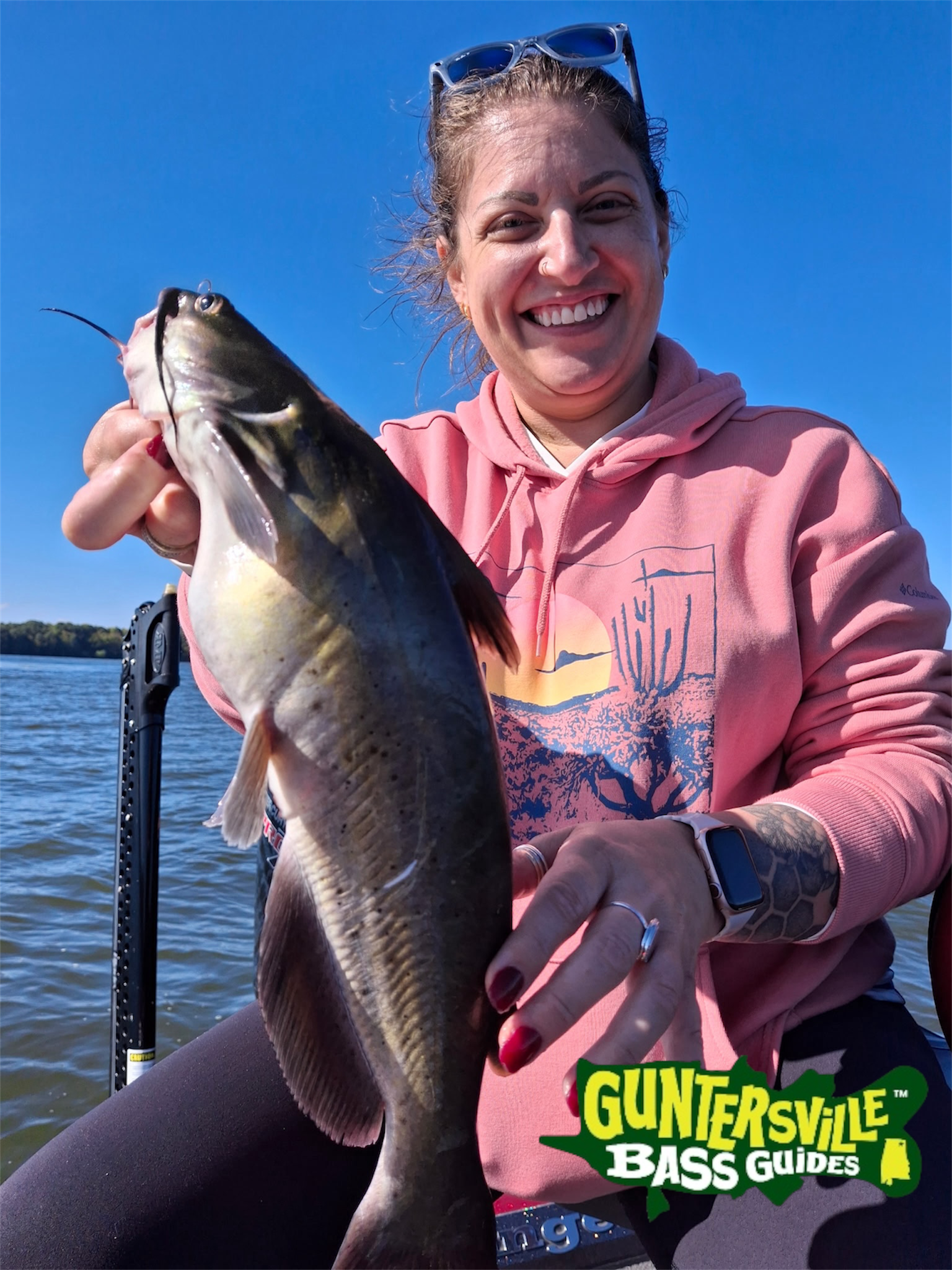 Corrie with catfish caught on Lake Guntersville