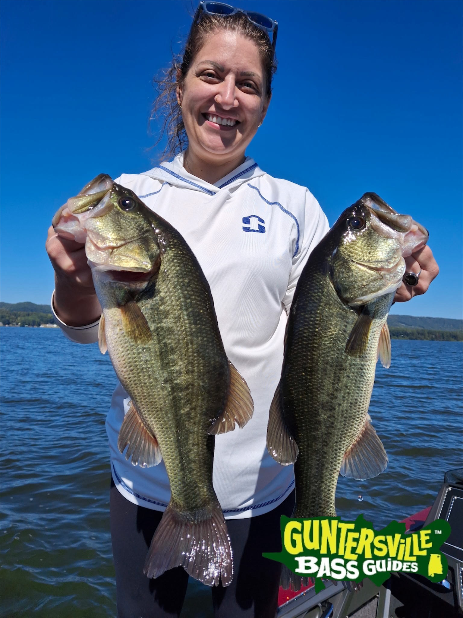 Corrie holding two Lake Guntersville bass