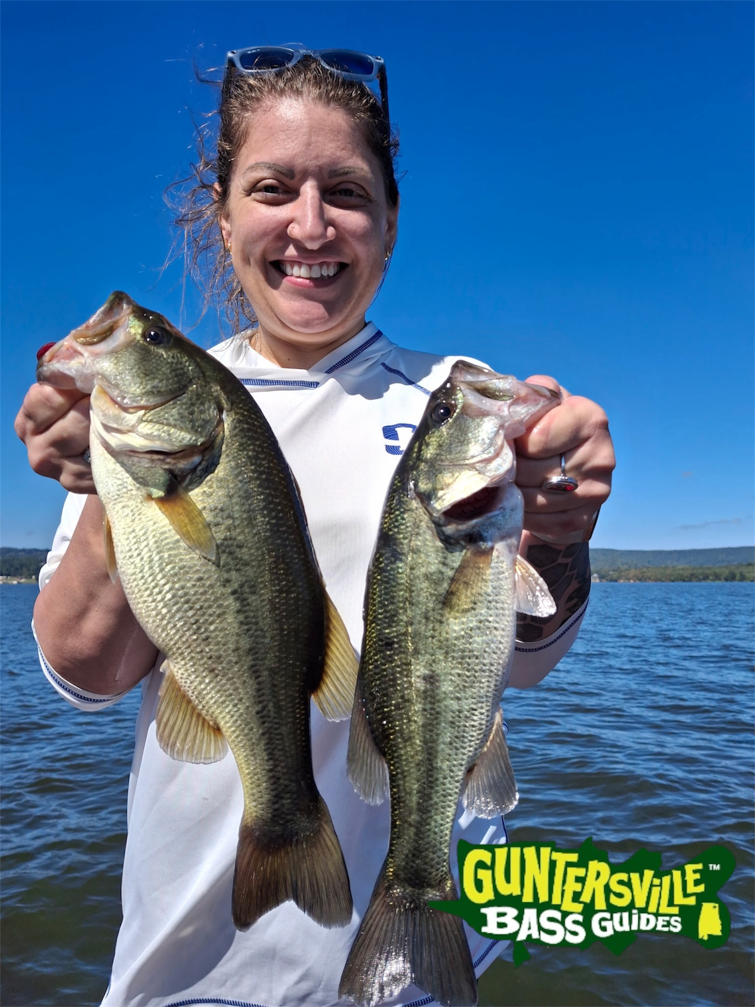 Corrie holding two Lake Guntersville bass