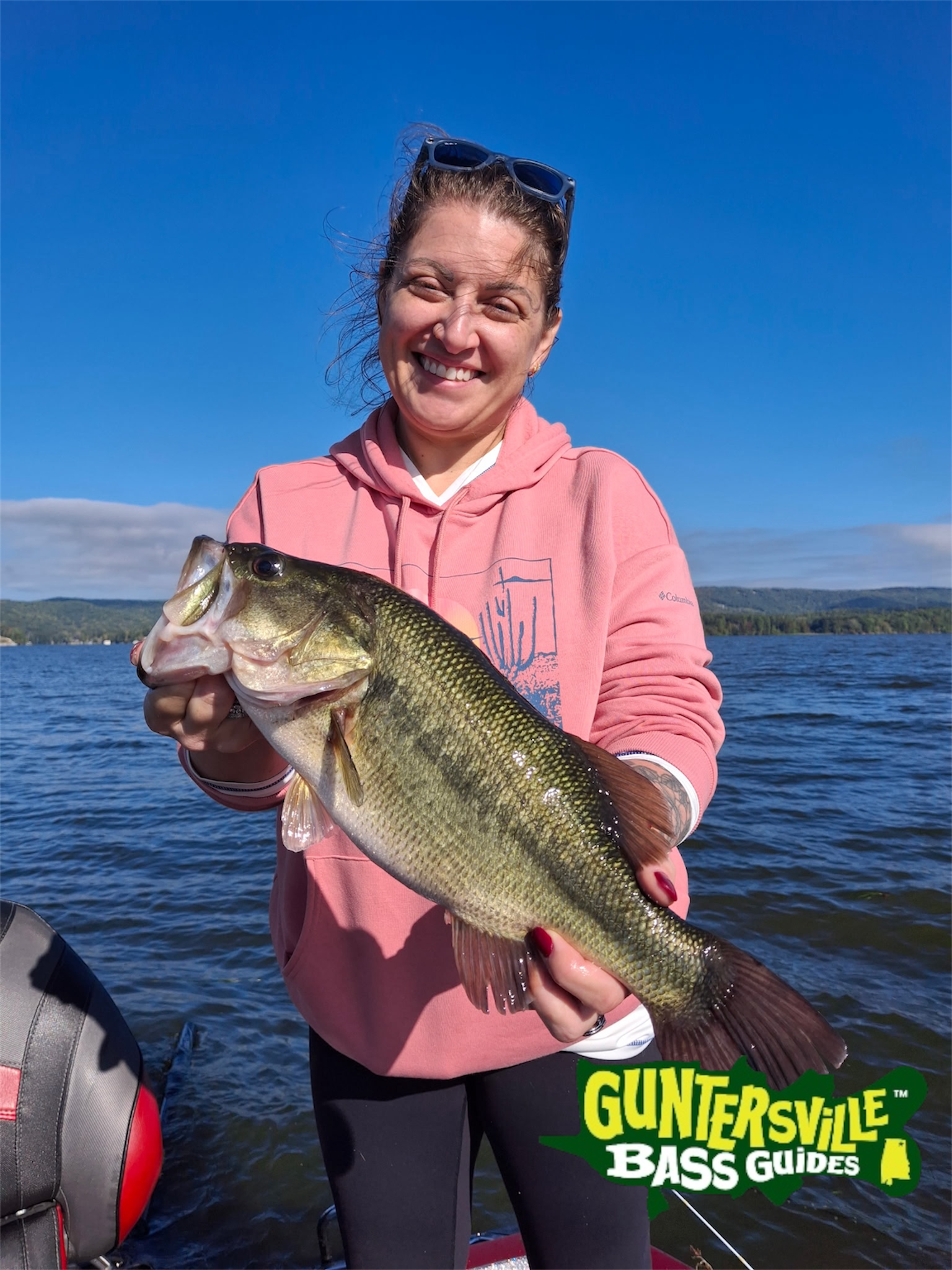 Corrie with big Lake Guntersville largemouth bass