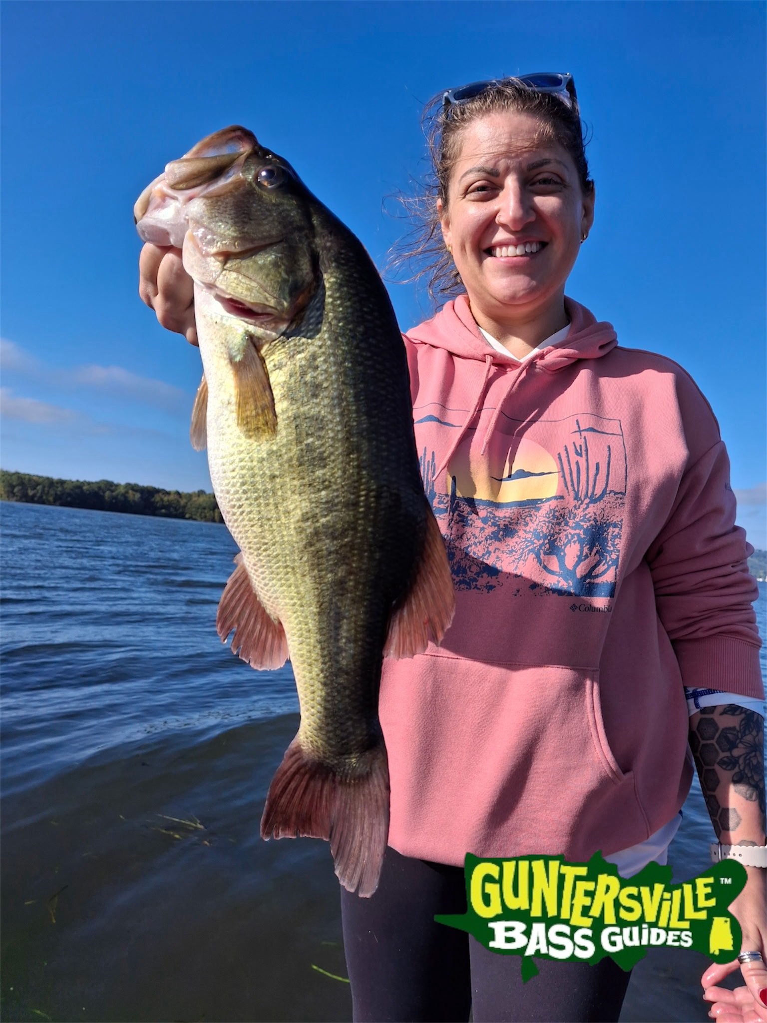 Corrie fishing with Captain Phillip on Lake Guntersville