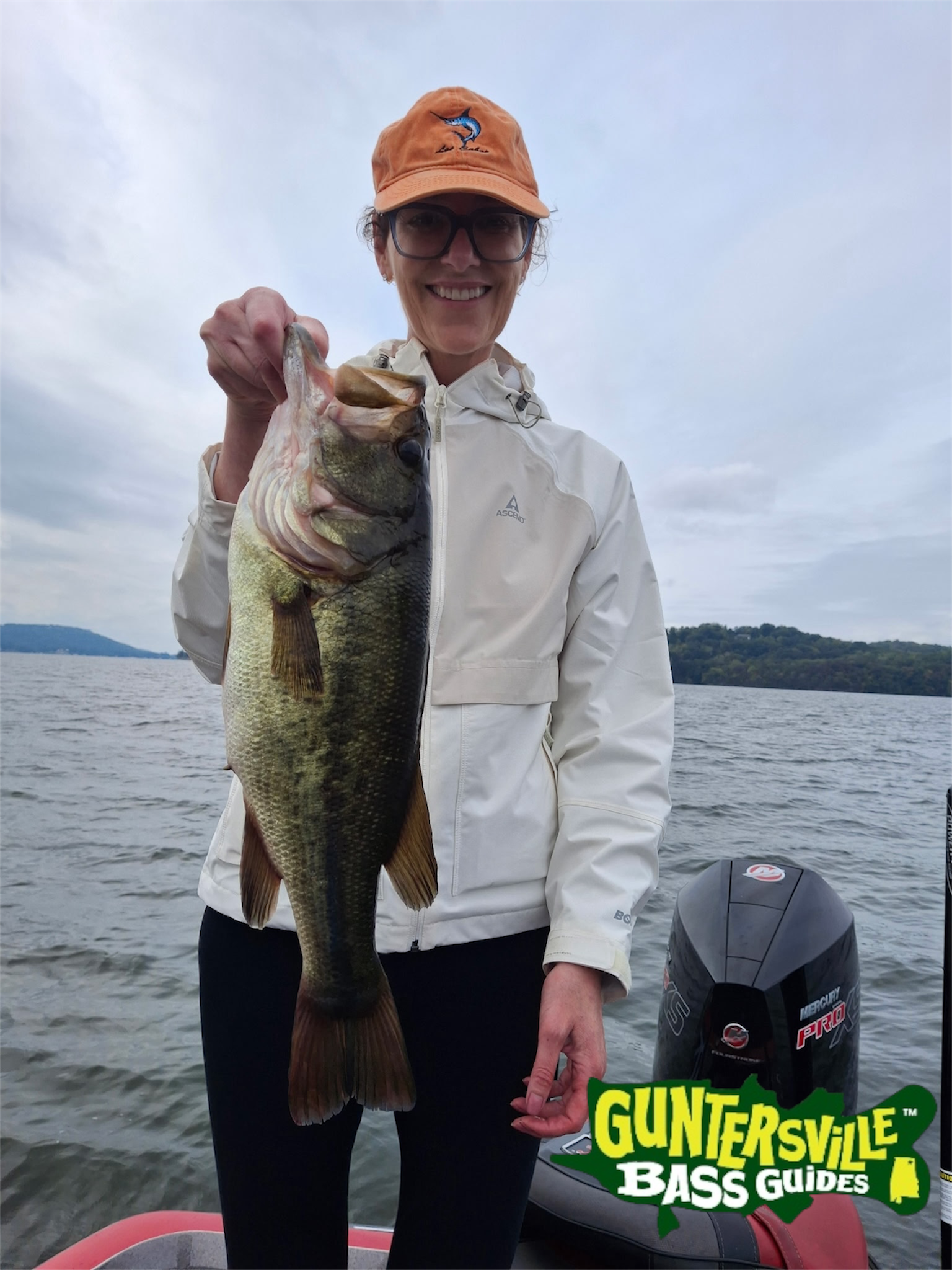 Australian angler catching bass on Lake Guntersville